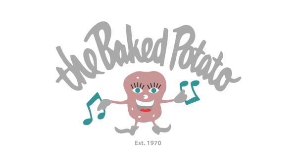 T B A